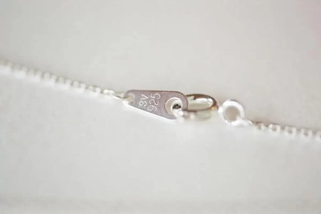 Silver jewellery, a chain tag engraved with SV 925