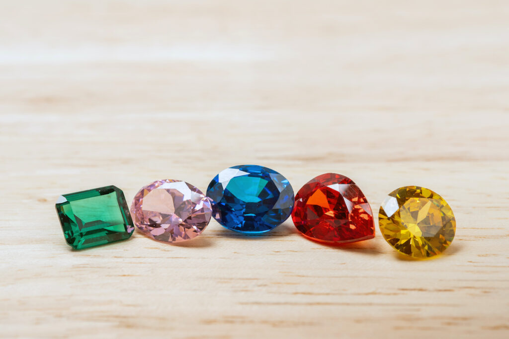 Natural gemstones of different shapes that can be used in an engagement ring.