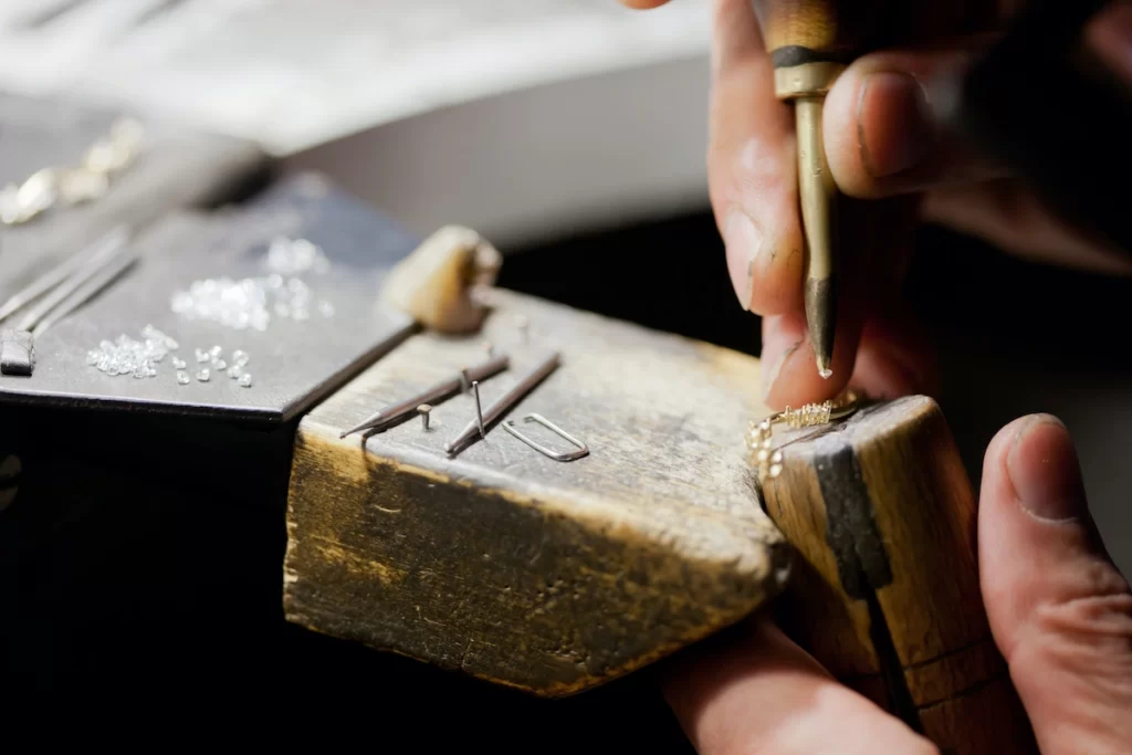 Setting gemstones in a jewelry piece.